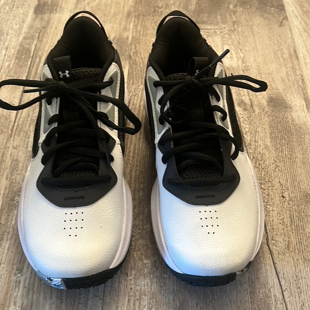 Brand new basketball or sport shoes without tags for girls.